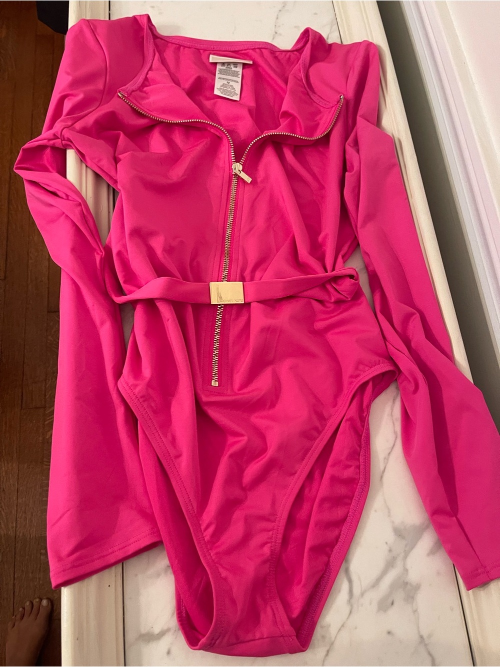 Michael Kors Hot Pink Long-Sleeve One-Piece with Gold Zip and Belt Accent